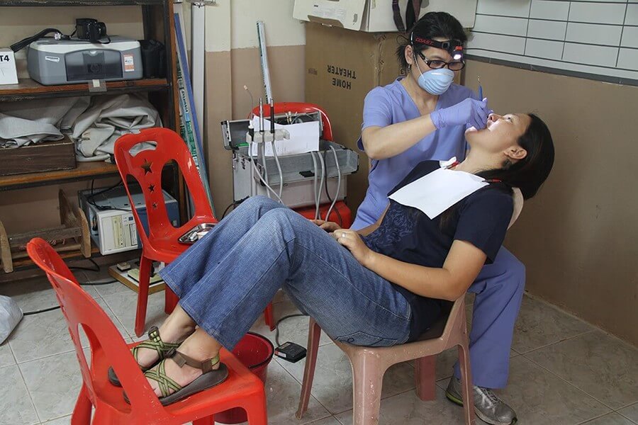 Dr. Chin treating a patient