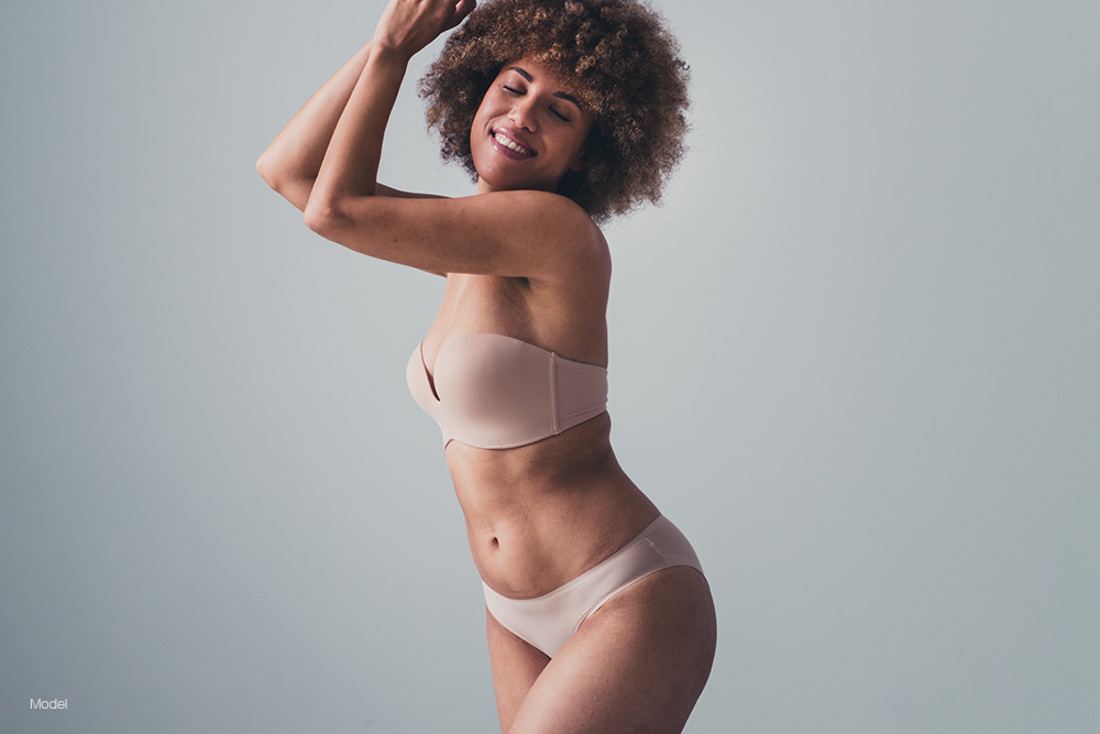 curvy woman in tan underwear